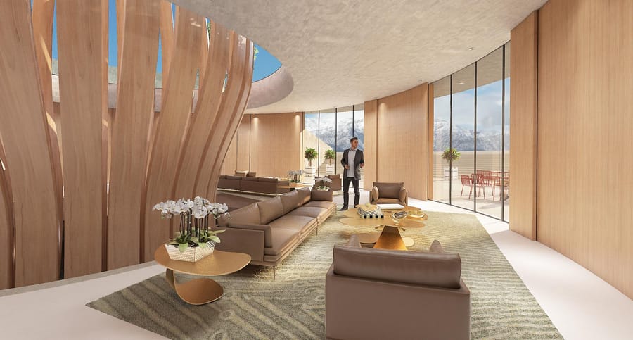 Grand salon contemporain aux structures en bois et canapés en cuir, doté de baies vitrées offrant une vue sur les montagnes