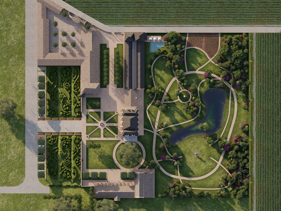 Vue aérienne d'un domaine viticole doté de bâtiments, de jardins paysagers et d'un étang, au Château Guiraud