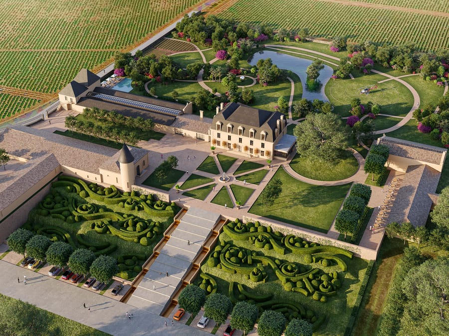 Vue aérienne d'un domaine viticole aux jardins paysagers sculptés, bâtiments traditionnels et étang, entouré de vignobles, Château Guiraud à Sauternes