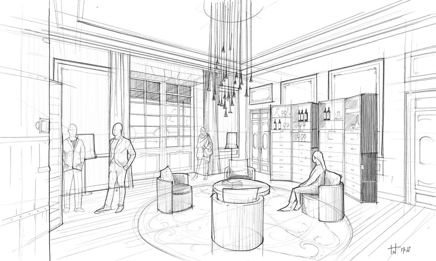 Aménagement intérieur d'un salon avec fauteuils autour d'une table basse, suspensions lumineuses et vitrines à vin au Château Tour Prignac