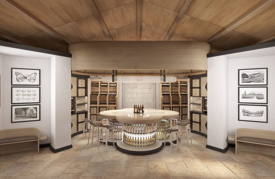 Salle de dégustation de vin avec un bar central polylobé, des tabourets et des casiers à bouteilles en bois