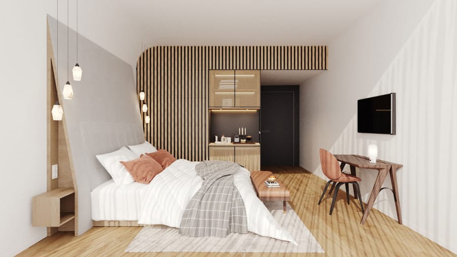 Chambre d'hôtel moderne avec lit double, tasseaux de bois muraux et coin bureau, Hôtel Agassac à Ludon-Médoc
