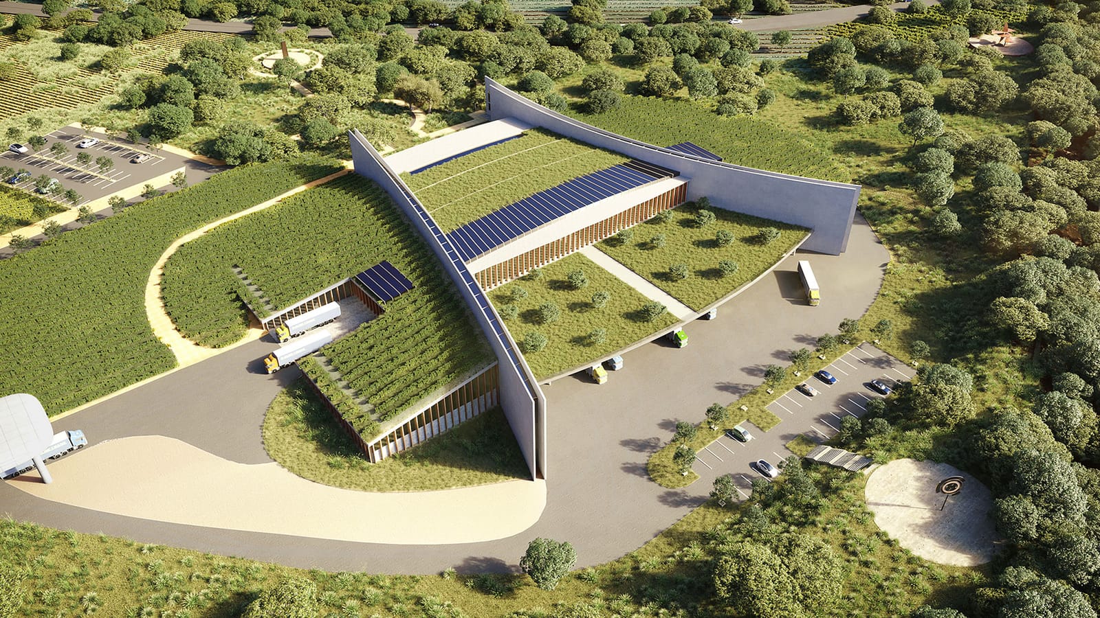 Vue aérienne d'un bâtiment moderne aux toits végétalisés équipés de panneaux solaires dans un cadre verdoyant