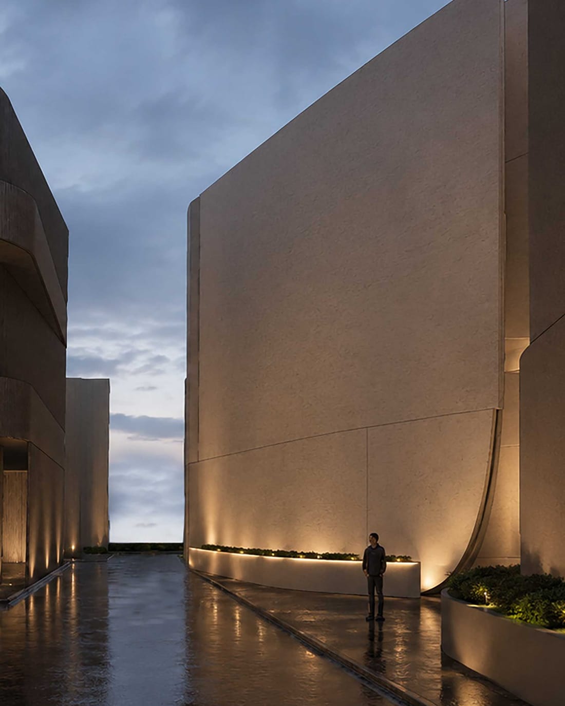 Façades monolithiques d'un data center à la tombée du jour